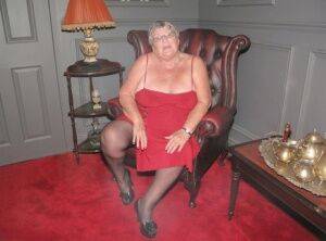 Obese grandmother Grandma Libby showcases her bald pussy in stockings on picsofsex.com