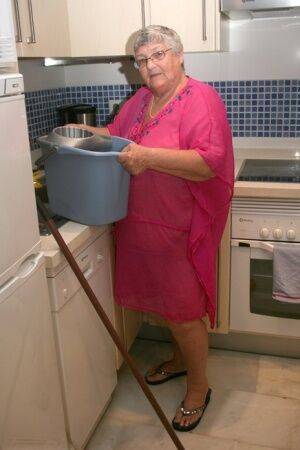 Fat UK nan Grandma Libby gets completely naked while cleaning her kitchen - Britain on picsofsex.com