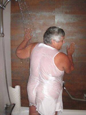 Obese amateur Grandma Libby blow drys her hair after taking a shower on picsofsex.com