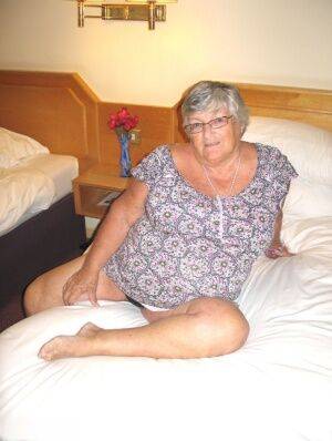 Silver haired British woman Grandma Libby exposes her fat body on a bed - Britain on picsofsex.com