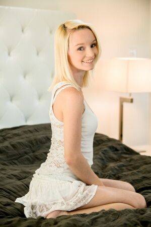 Tiny blonde teen Sammie Daniels removes cotton panties to finish getting naked on picsofsex.com