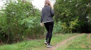 White girl is captured on hidden camera taking a piss in someone's garden on picsofsex.com