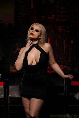 Nadia White looking hot in her black dress on picsofsex.com