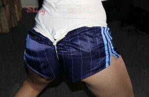 Sonja wearing a sexy oldschool blue shiny nylon shorts and a white top being on picsofsex.com