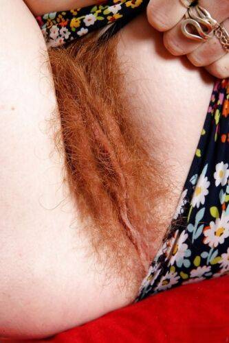 Redheaded mom Ana Molly displaying hairy vagina for close ups on picsofsex.com