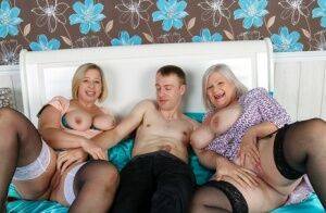 Older blonde fatties treat a surprised younger guy to a threesome on picsofsex.com