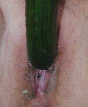 Mature platinum blonde Dimonty masturbates with a banana and a cucumber on picsofsex.com