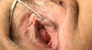 Yume Sazanami Asian puts nipples of huge hooters under scissors on picsofsex.com