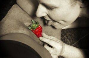 Mature lesbian Mollie Foxxx and her lover use strawberries during foreplay on picsofsex.com