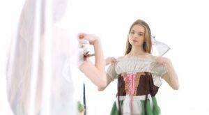 Young beauty Adel Bye dresses in an Oktoberfest outfit to greet her boyfriend on picsofsex.com