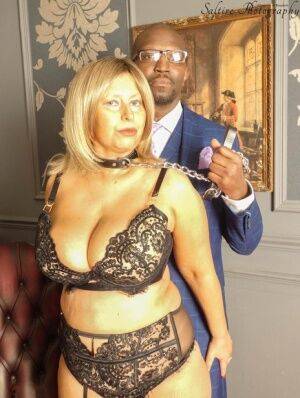 Overweight aged blonde Posh Sophia kneels afore her black owner while collared on picsofsex.com