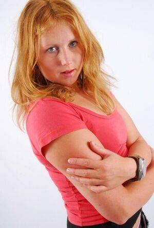 Judy wearing a huge OOZOO cuff watch on picsofsex.com