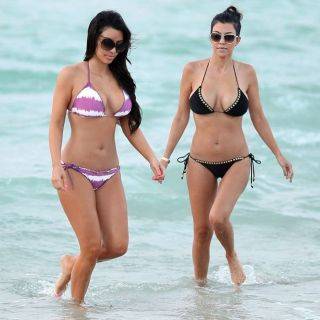 Teen celeb kim kardashian posing on the beach on picsofsex.com