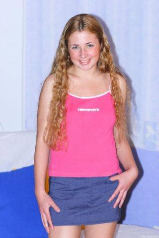 Curly haired blonde teen angel pleasing her pink pussy hard on picsofsex.com