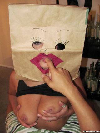 Busty gf fucked n facialed with paper bag on head on picsofsex.com