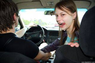 Teen sucking cock and fucked on car on picsofsex.com