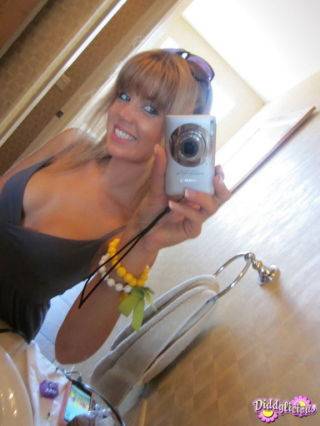 Cute amateur teen girl teasing in mirror on picsofsex.com