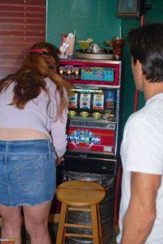 Gangbang dee fucks a guy near a slots machine on picsofsex.com