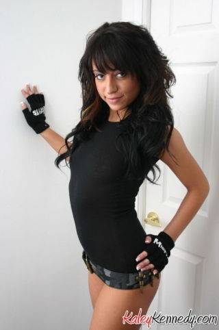 Kaley shows off her bullet belt on picsofsex.com