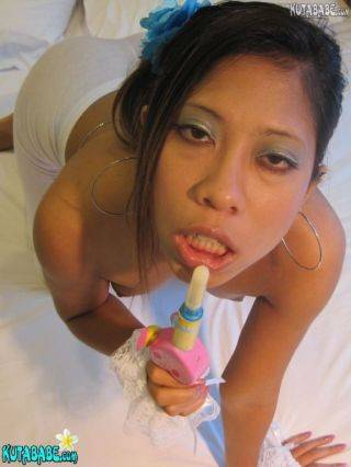 Asian bali teen girl gives bj on picsofsex.com