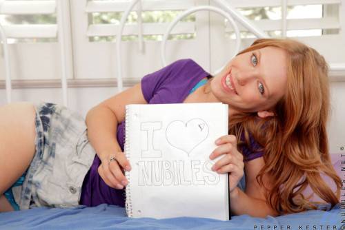 Redhead Pepper Kester Spreads Her Long Legs And Fills Her Pink Love Hole With Toys on picsofsex.com