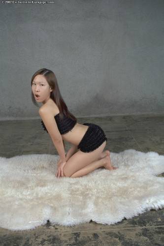 Stunning oriental youthful Bee uncovers tiny tits and nice pussy on picsofsex.com