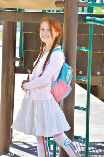 Luscious american red-haired teen Dolly Little in fancy skirt exposing small tits and playing with dildo outside - Usa on picsofsex.com