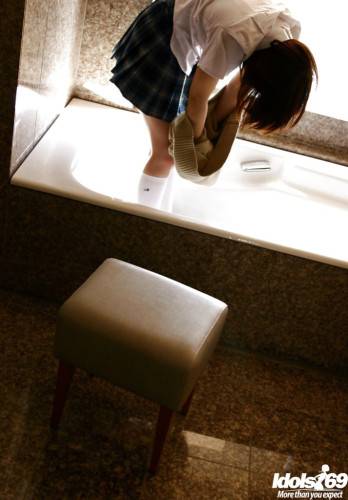 Stunning japanese teen Hina Tachibana exposes big tits and hot butt in the bathroom - Japan on picsofsex.com