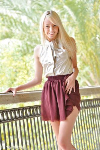 Sylphlike american blonde young Sierra Nevadah in nice skirt baring small tits and playing with dildo - Usa on picsofsex.com