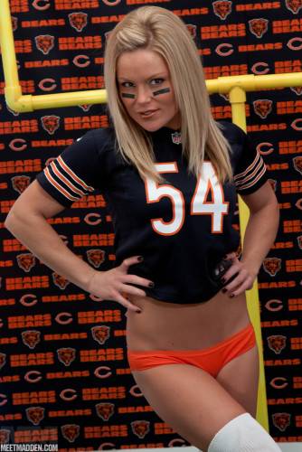 Sporty Golden Haired Girl Meet Madden Enjoys In Taking Her Jersey Off For The Team on picsofsex.com