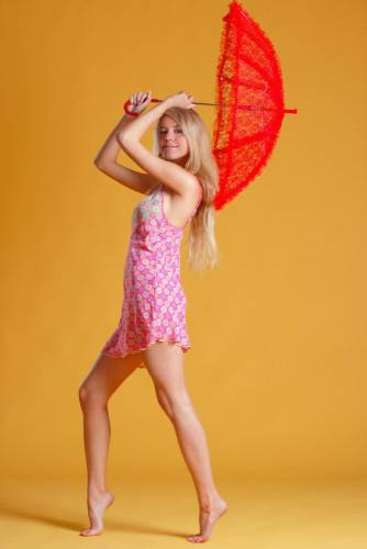 Leggy And Elegant Blonde Chick Barbara D Shows Off Her Fine Teen Bod With A Parasol on picsofsex.com