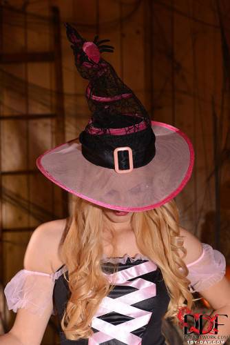 Hot Blonde Witch Mira Varga Is Playing With Her Shaved Pussy On Halloween Eve on picsofsex.com