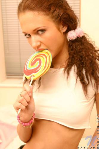 Skinny Teenie Miss Taylor Nubiles Licks Massive Lollipop And Gets Undressed on picsofsex.com