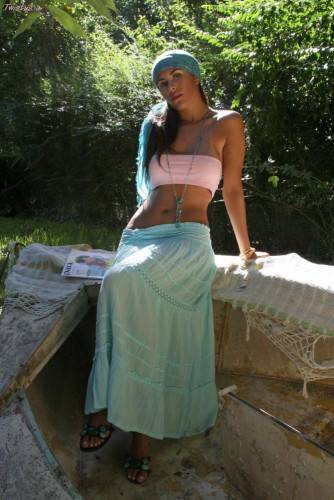 Latin Chick Isobel Riveira Lifting Her Long Skirt Up Demonstrating Hot Slit And Nasty Posing Outdoor. on picsofsex.com