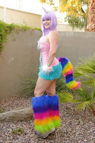 Excellent hottie Danielle Delaunay in cosplay costume baring big hooters and toying her pussy outdoor on picsofsex.com