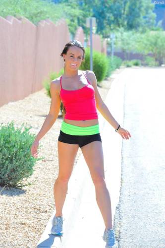 Sporty Brunette Babe Rahyndee James Strips Outdoors And Teases In The Middle Of The Road on picsofsex.com