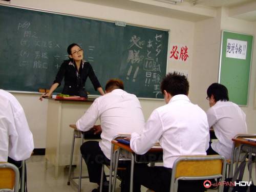 Kinky Teacher In Uniform Yui Komine Is Doing Blowjob Over Studentâ€™s Piston on picsofsex.com