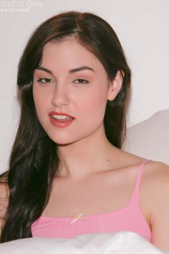 Lewd Brunette In Pink Lingerie Sasha Grey Naughtily Shows Tits And Flashes Pussy on picsofsex.com