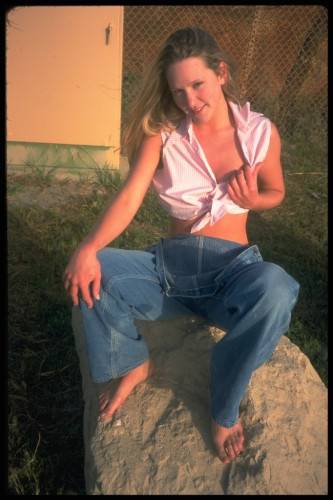 Shaved Pussy Chick Alexis Malone In Jeans And Thong Does Striptease In The Field on picsofsex.com