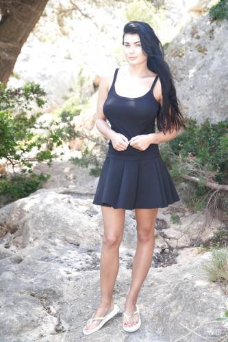 Inviting czech brunette Lucy Li in skirt showing big knockers and hairy beaver outside - Czech Republic on picsofsex.com