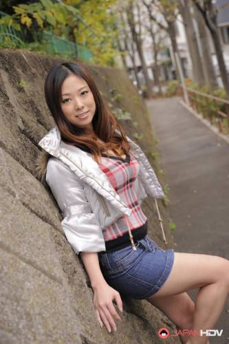 Asian Chick In A Short Jeans Skirt Asuka Is Sexily Posing In The Autumn City on picsofsex.com