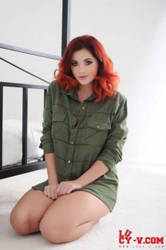 Real Redhead Beauty Lucy Vixen Unbuttons The Shirt And Uncovers View On Big Melons on picsofsex.com