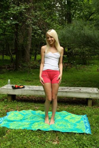 Blonde Teenager Sierra Nevadah Sets On The Green Lawn And Dildo Fucks The Beaver on picsofsex.com