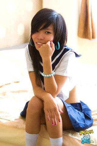 Puy is dressed like a sailor girl and needs a cock to ride on - Thailand on picsofsex.com