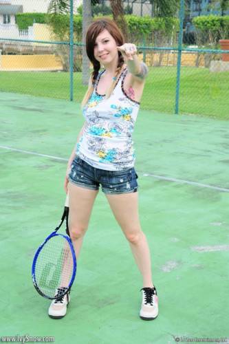 Heavy Chested Pale Brunette Ivy Jean Exposes Her Tattoos On The Tennis Court on picsofsex.com