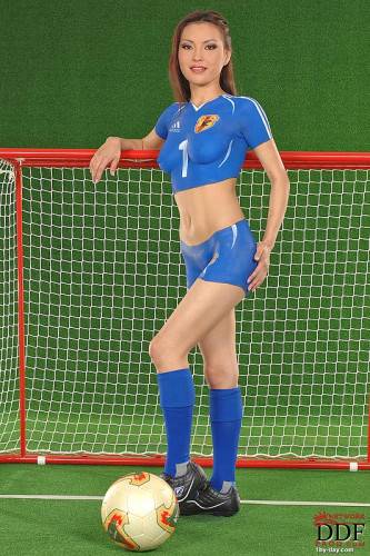 Oriental Body Art Model Annie Ling Pretends That She Wears Blue Skin Tight Soccer Uniform on picsofsex.com