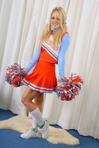 Sexy Cheer Girl Tanya P Poses In Her Cheerleader Uniform And Shows Her Panties on picsofsex.com