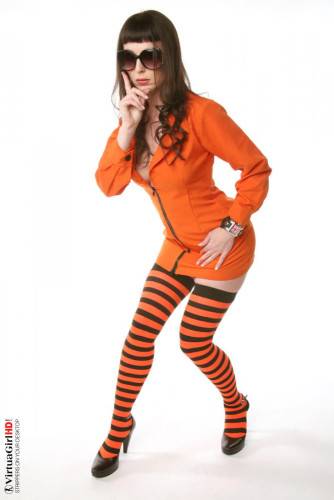 Frisky Babe Jennifer Galbina Ripping Off Her Uniform And Posing In Nothing But Striped Stockings on picsofsex.com