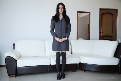 Foxy dark hair teen Eilona in sexy skirt loves foot fetish on picsofsex.com