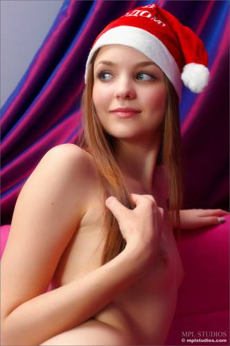 Dirty Girl Amelie Femjoy Enjoys In Playing A Sexy Santa Girl On The Couch on picsofsex.com